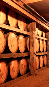 Rack of bourbon barrels.